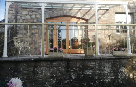Milwood Group Veranda Installation Llangattock Wales Simplicity 6 Canopy Pro