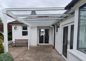 Aesthetic Veranda Installation Wales Bespoke Design Around Drainage Pipe Canopy Pro Ltd