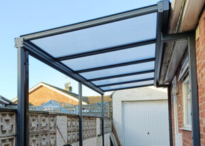 Robust and Practical Simplicity 16 carport installation in York at domestic home bungalow, installed by our Trade Partner Alfresco Canopies